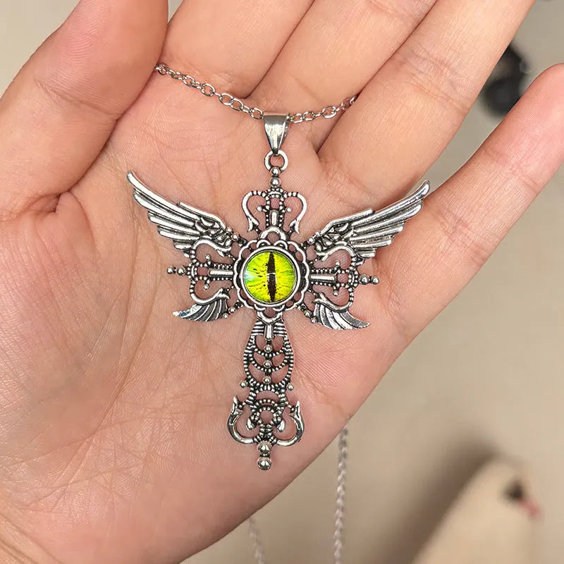 Geometric devil wings and cross alloy pendant necklace in blue on a silver chain.