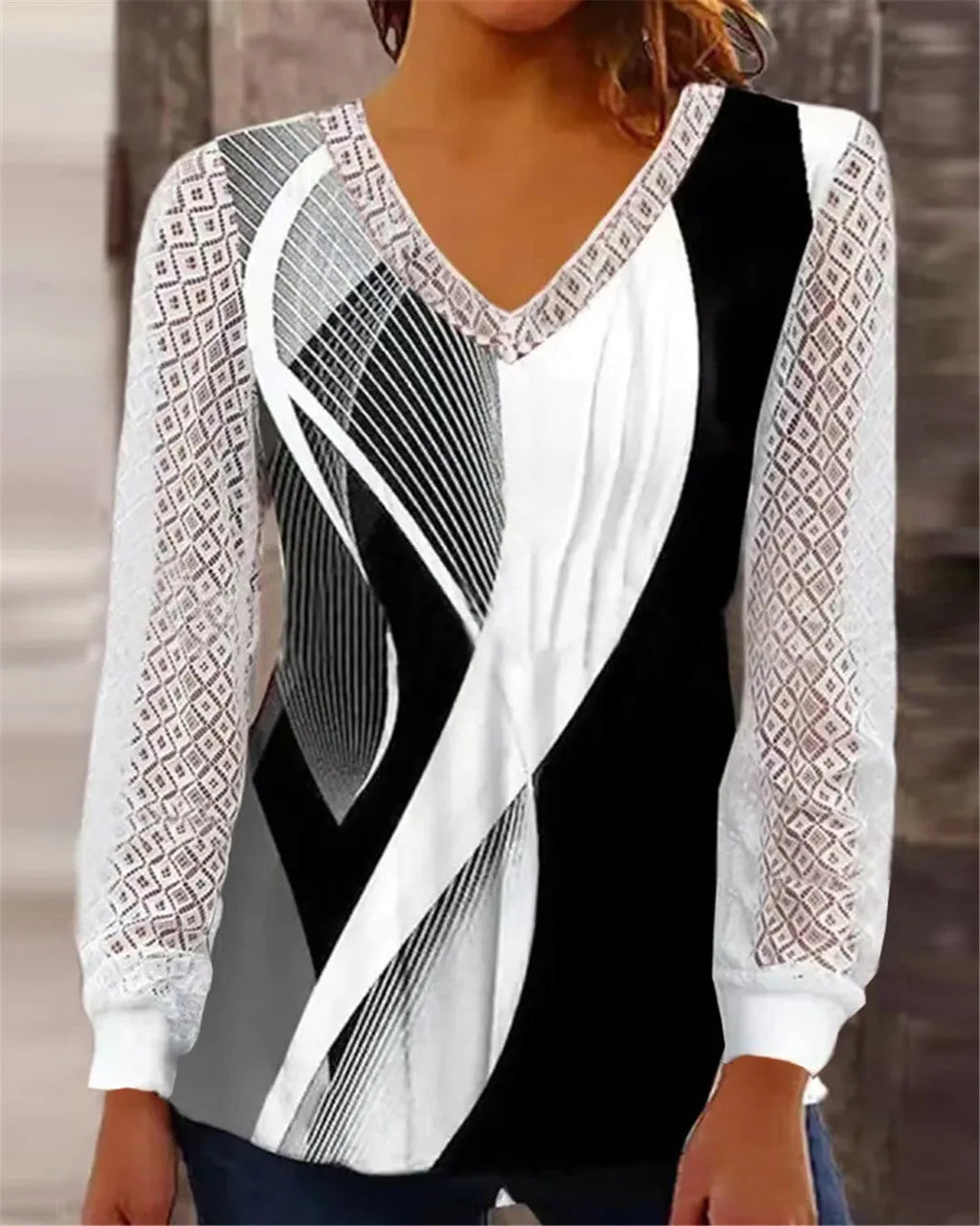 Purple V-neck loose top with hollow-out lace pattern and long sleeves
