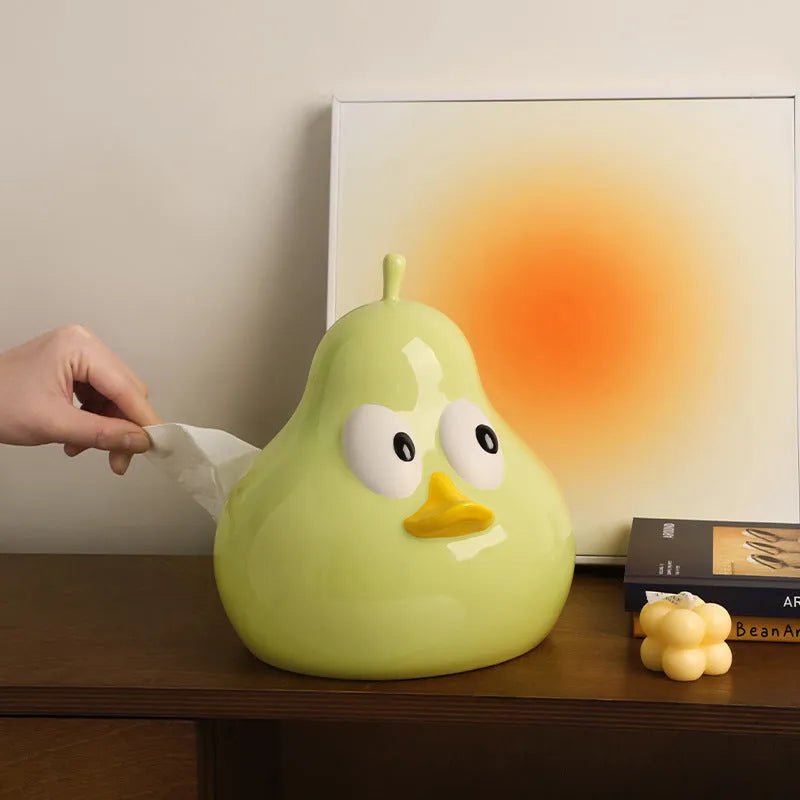 Green ceramic tissue box with cute pear design for living room or desktop.