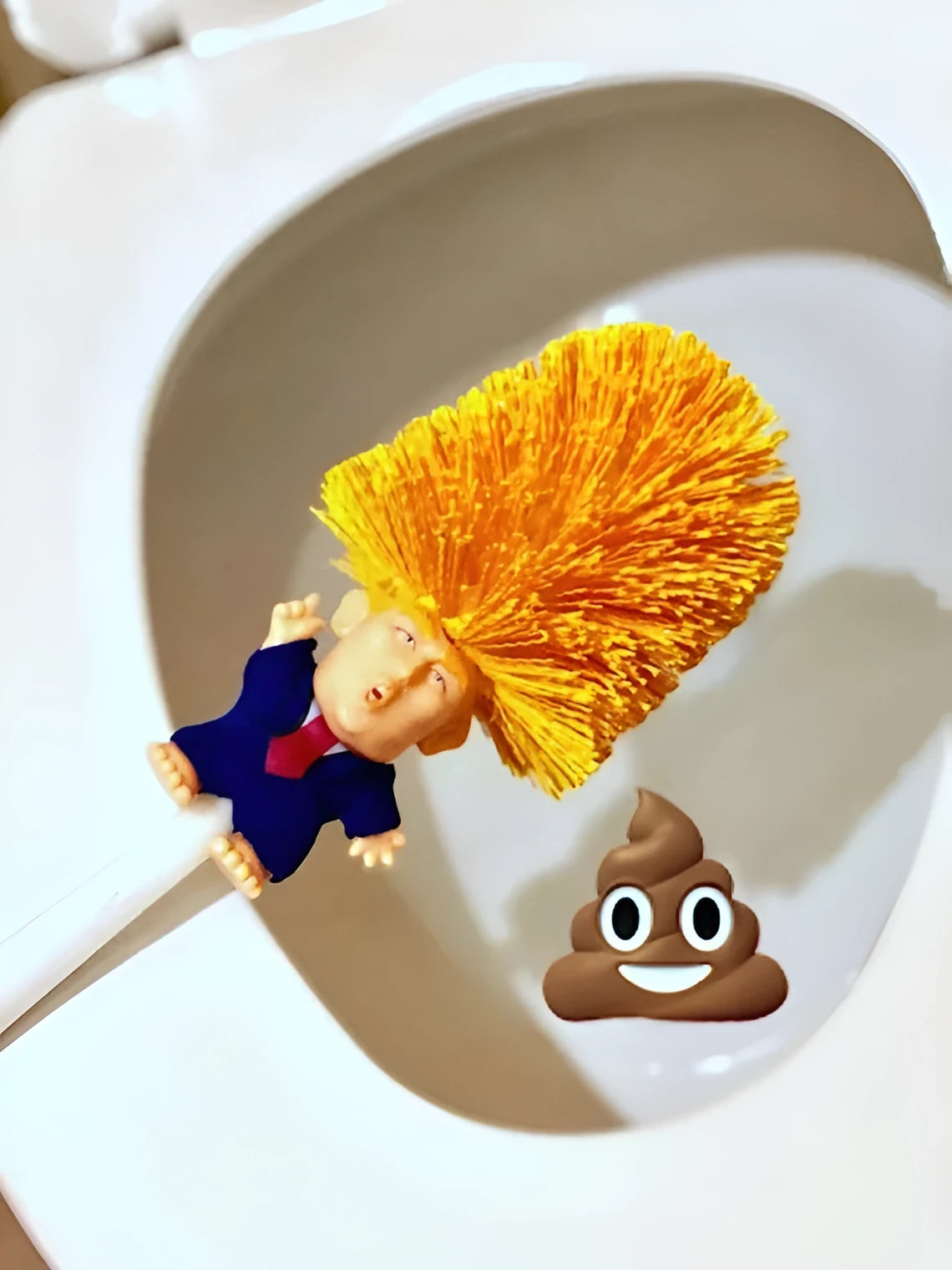Yellow plastic Donald Trump toilet brush with 40cm length and hanging slot handle