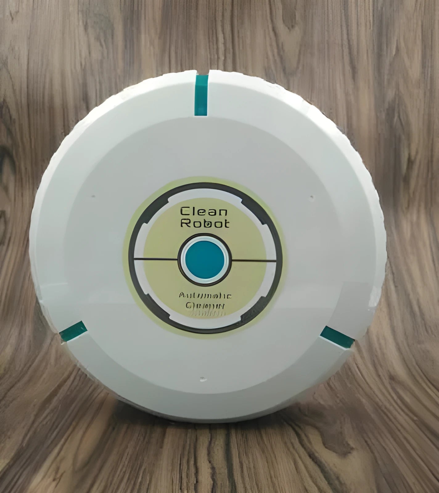 Black and white compact AC automatic sweeping robot vacuum cleaner on a wooden floor.
