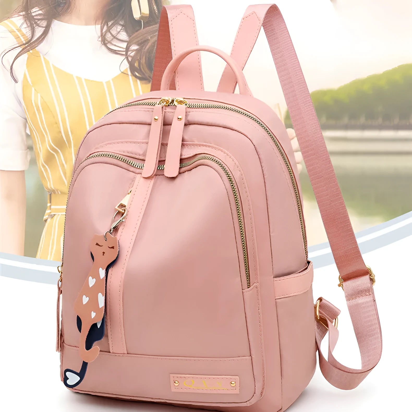 Black and pink casual nylon backpack with double straps, soft handle, and external pocket.