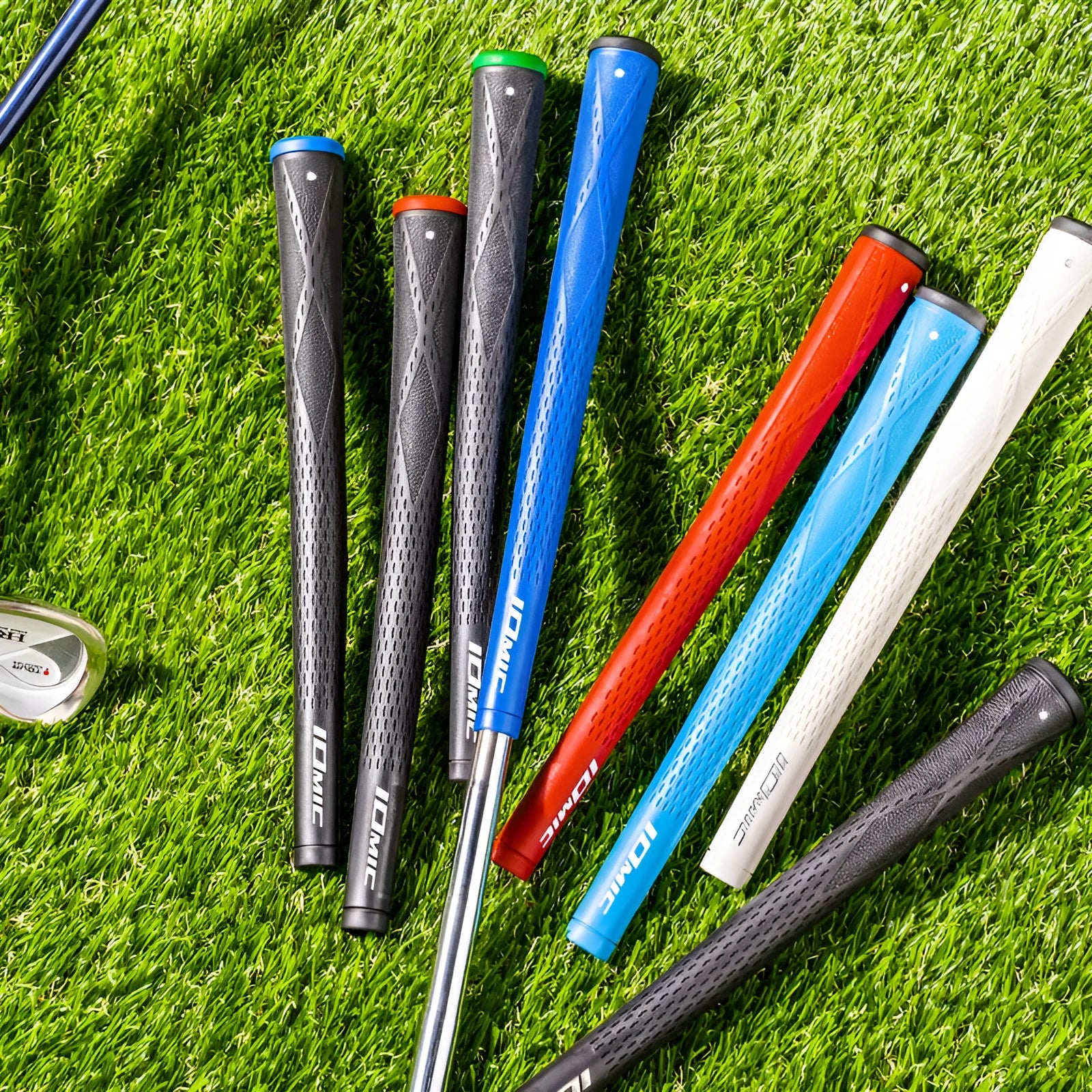 TPE and TPR material golf club grip shown in assorted colours including pink, red, blue, and black with coloured heads.