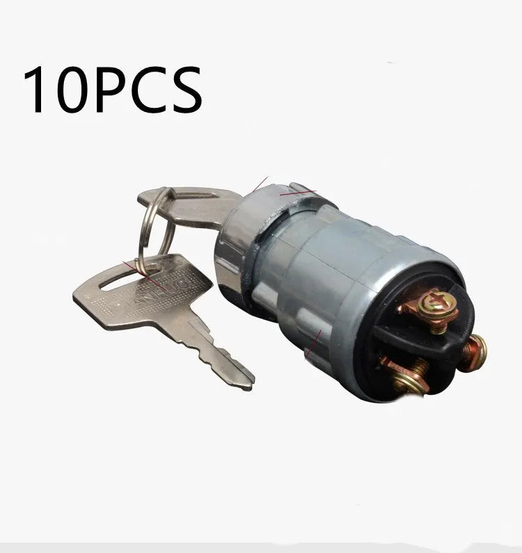 Copper vehicle ignition switch with a key for trucks and forklifts.