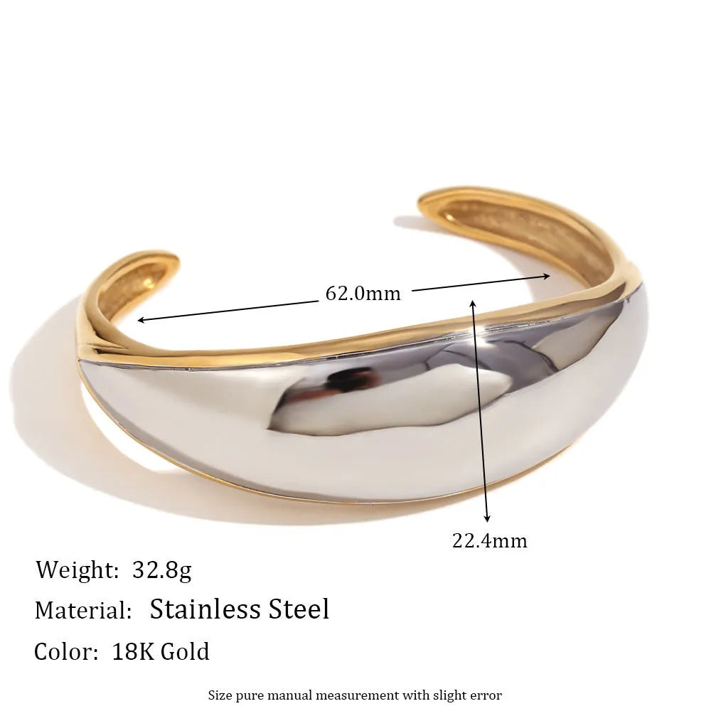 Gold geometric stainless steel jewellery set for women, showing earrings, necklace, and bracelet with electroplated finish.
