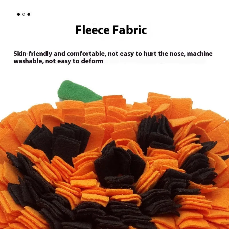 Orange pumpkin-shaped pet training mat with textured fleece surface for slow feeding