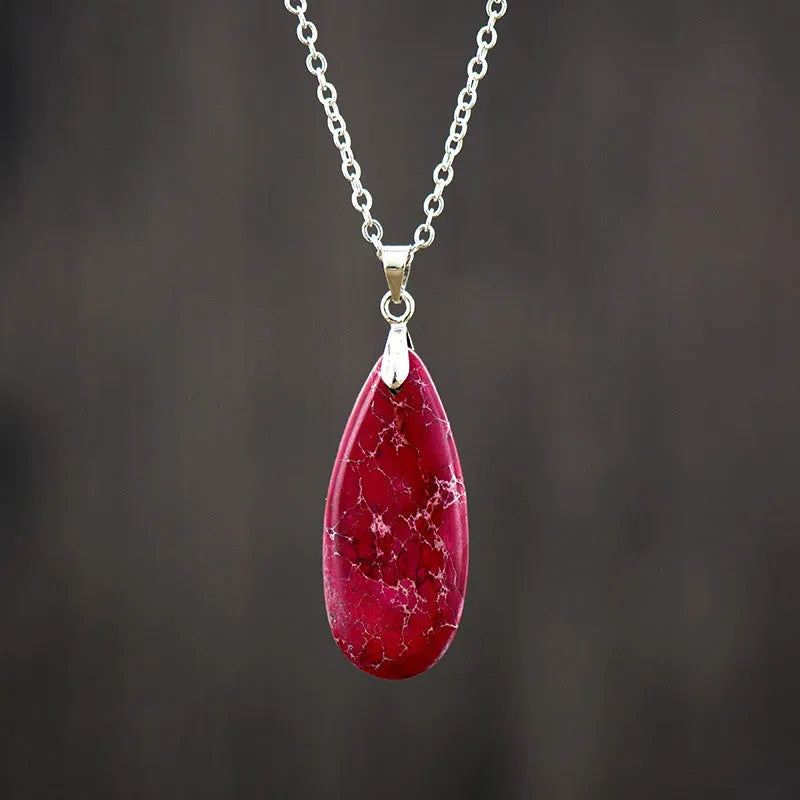 Emperor Stone jade water drop pendant necklace on an 18K gold plated chain, showing heart-shaped and constellation design options.
