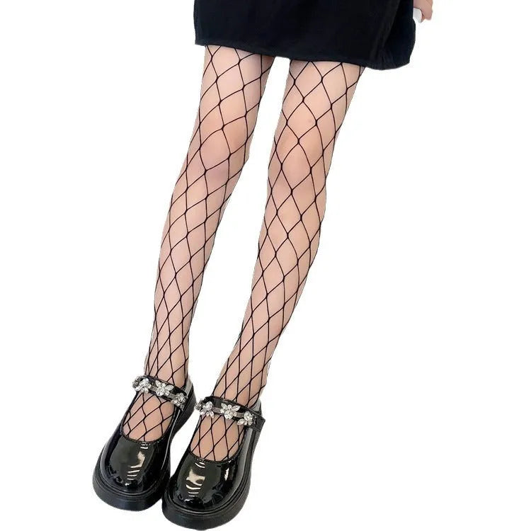 Women's mesh stockings in large, medium and small patterns in black and white colours