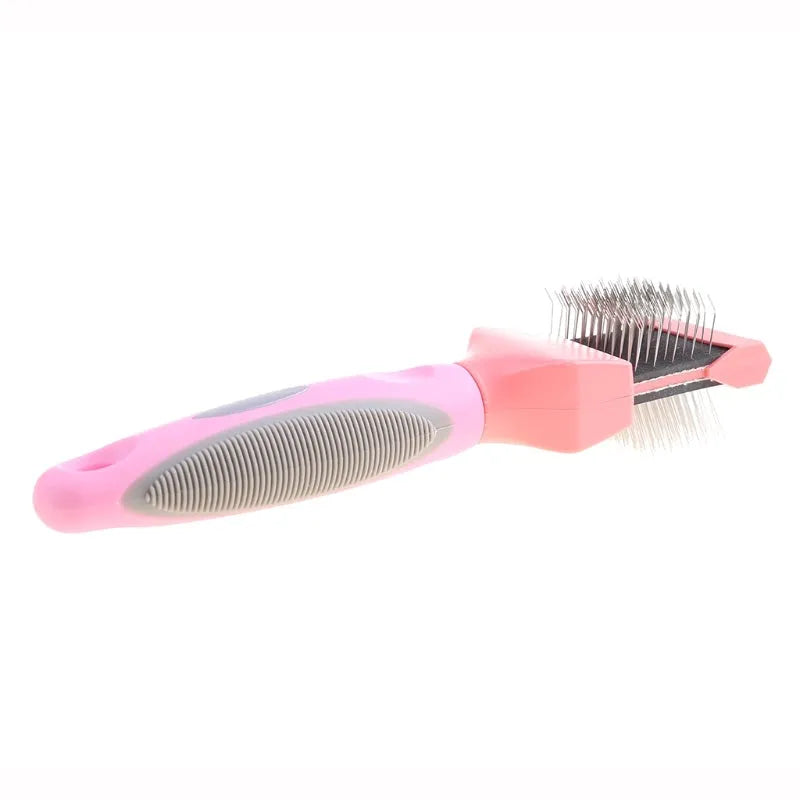 Blue double-sided pet brush with stainless steel pins on one side and soft bristles on the other, showing ergonomic handle.