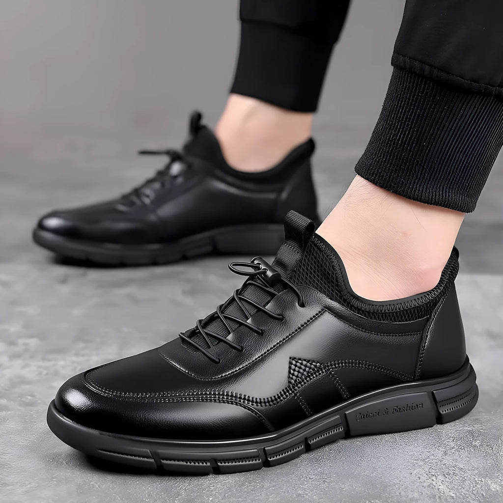 Men's black leather casual shoes with waterproof features and leather stitching details