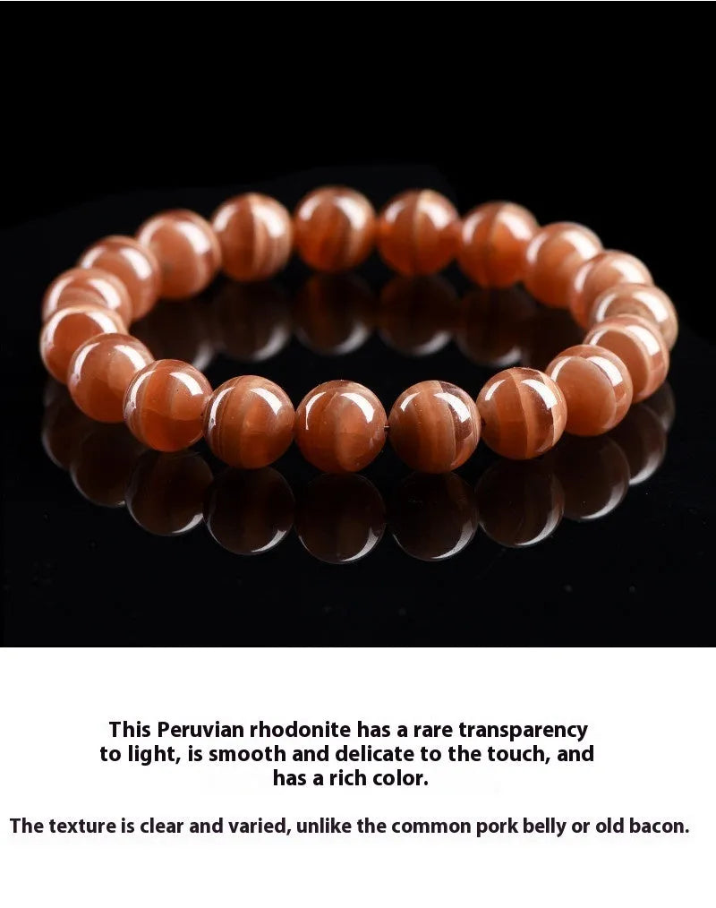 Natural Old Mine Rhodochrosite round bead bracelet with Ruyi element, shown in 6mm and 8mm sizes.