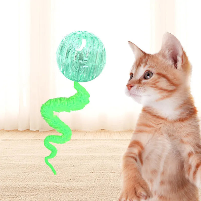 Interactive TPR bouncy ball cat toy with soft plush worm tail in green, pink or purple