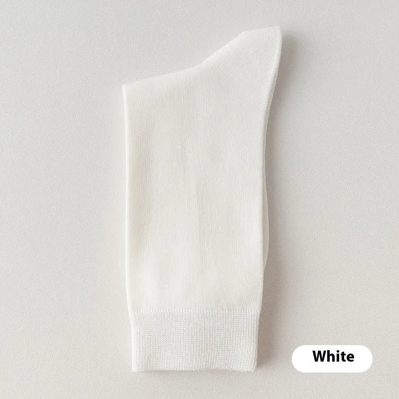 Mid-calf men's business socks in combed cotton available in twelve solid colours