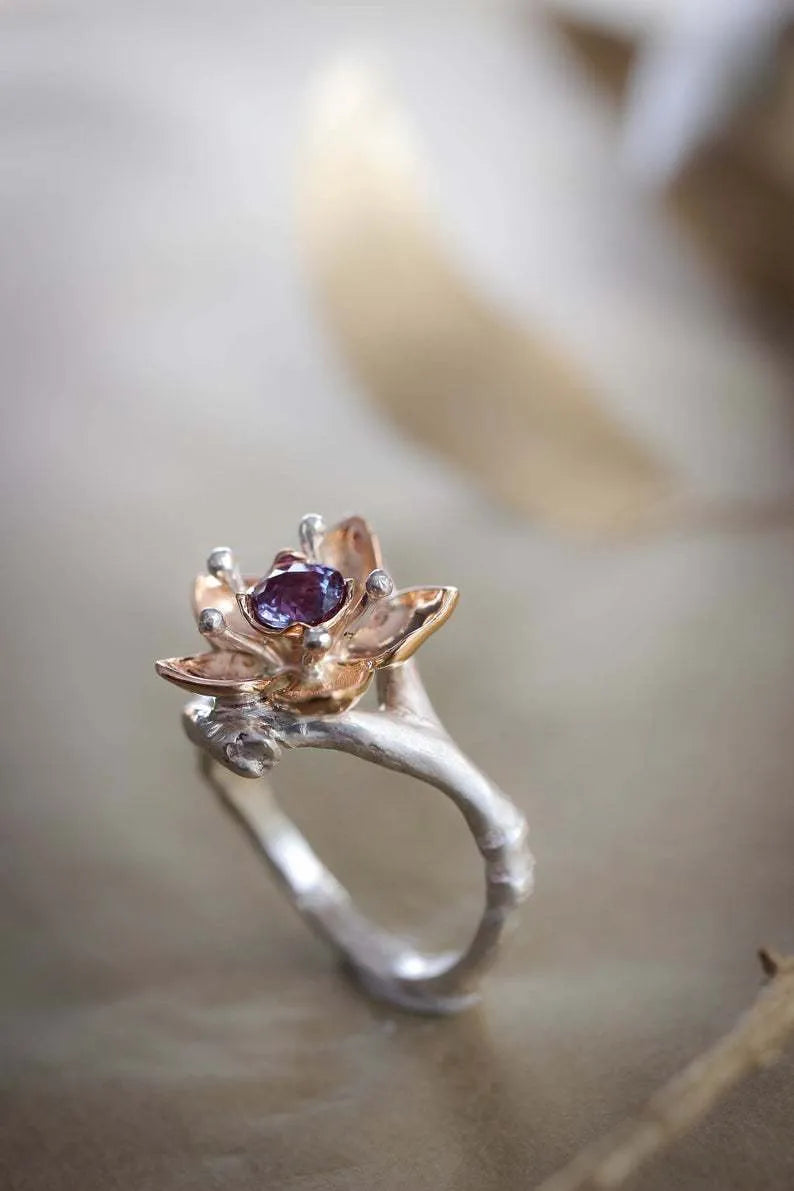 Silver two-tone floral geometric women's alloy ring shown on size guide from 5 to 11.