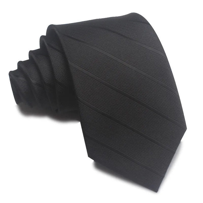 A man's striped formal tie in an arrow style, showing the jacquard texture and width of 7-8 cm.