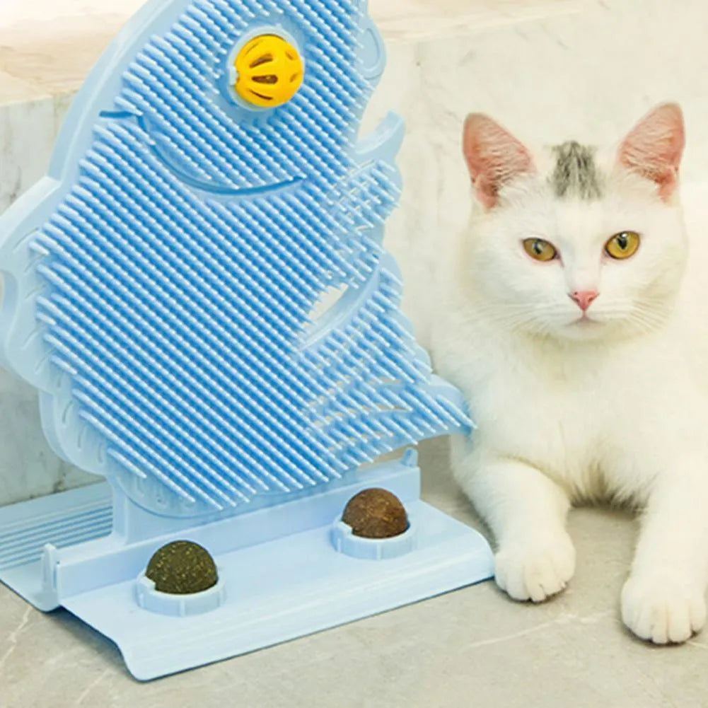 Blue fish-shaped plastic cat wall scratcher with self-grooming brush, catnip balls and mini bell