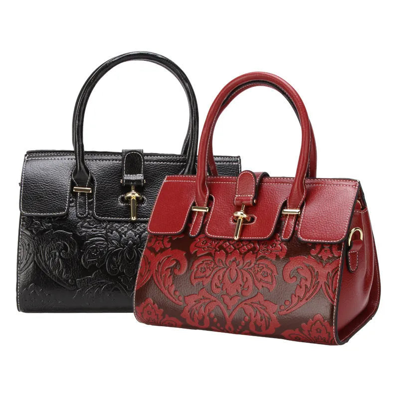 Women's vintage leather crossbody bag in red with embossing and multiple internal compartments