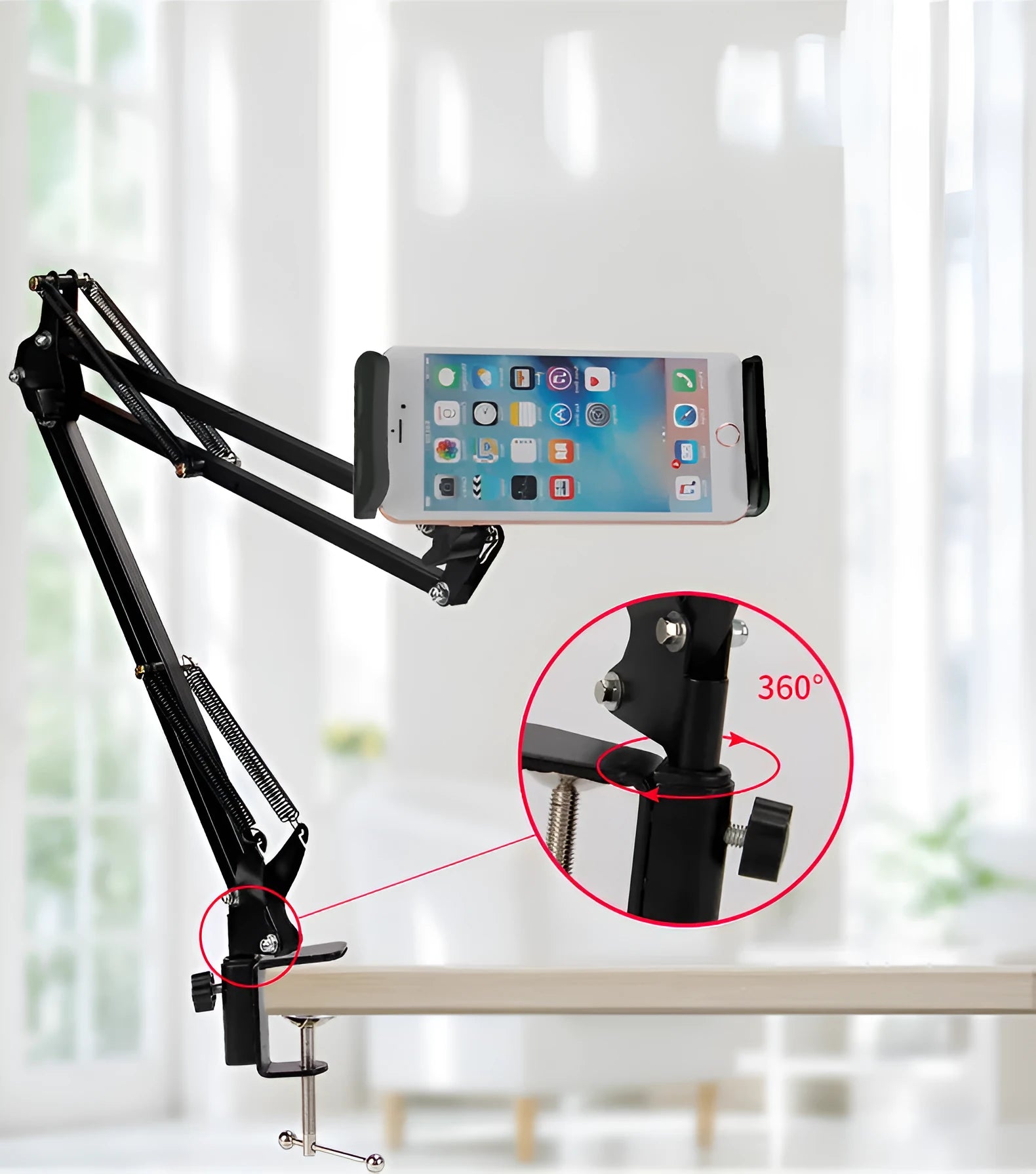 Adjustable black phone and tablet stand with 10cm base on a wooden desk