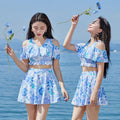Fresh blue floral women's one-piece swimdress in polyester fabric