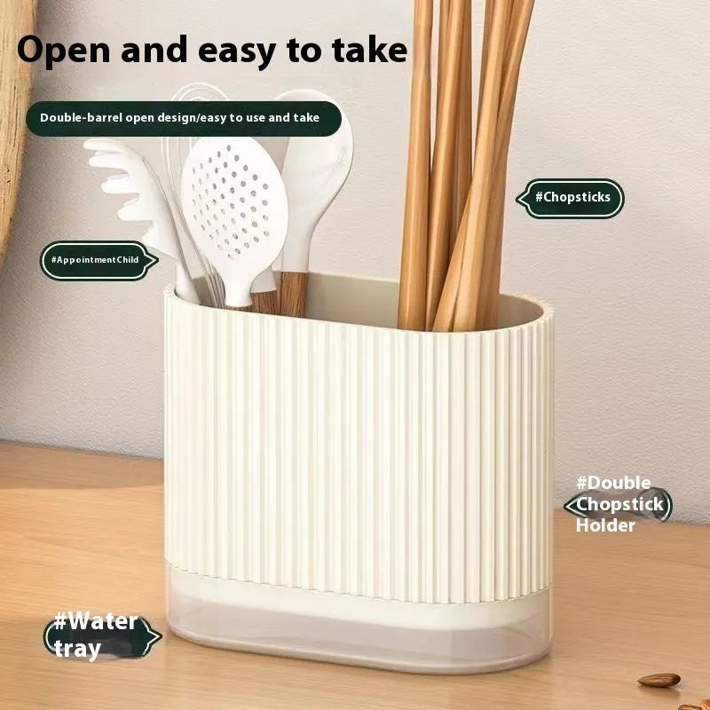 Modern plastic chopsticks tube holder mounted on kitchen wall holding utensils
