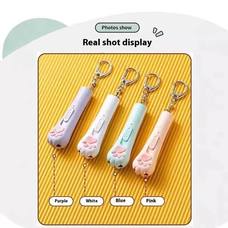 Self-charging plastic cat pen light teaser toy in pink, cream, or sky blue.