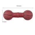 Brown, orange, white, and yellow PVC football and dumbbell shaped squeaky dog chew toys.