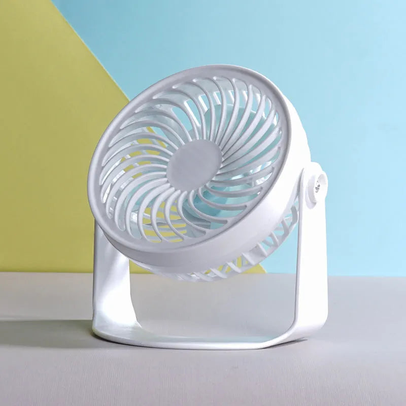Small white USB desktop fan shown as a clip-on model and a floor-standing model on a wooden desk.