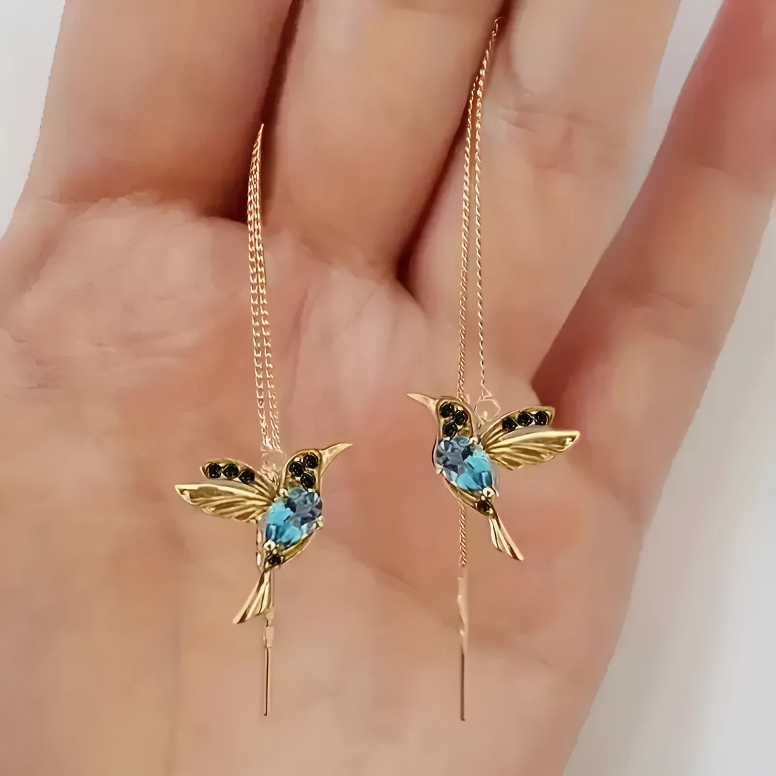 Bird hanging earrings for women in long style with mixed zirconium wings on electroplated alloy.
