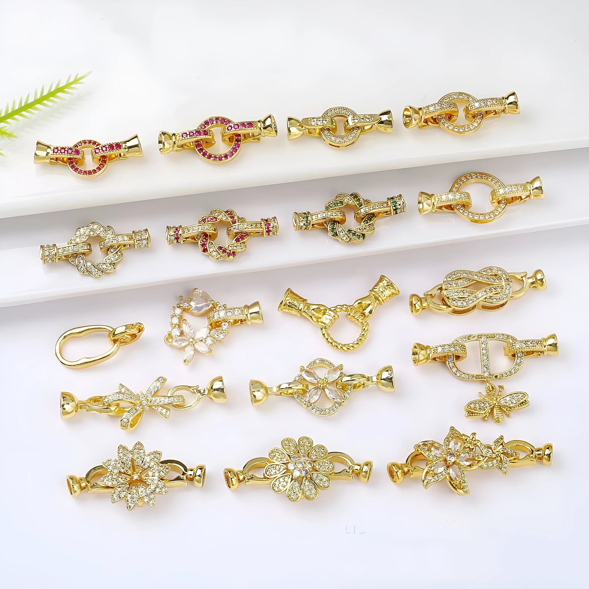 Small gold-plated brass jewellery clasp with white pearl detail for DIY necklace projects