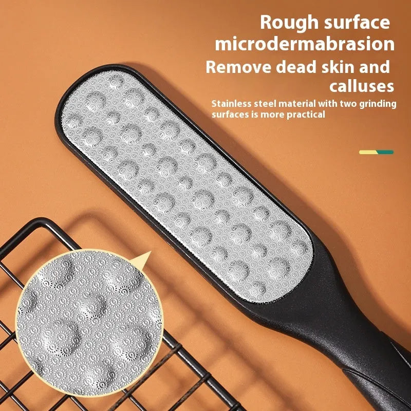 Stainless steel foot grinder file with attached sandpaper pad and separate black and white refill packs.