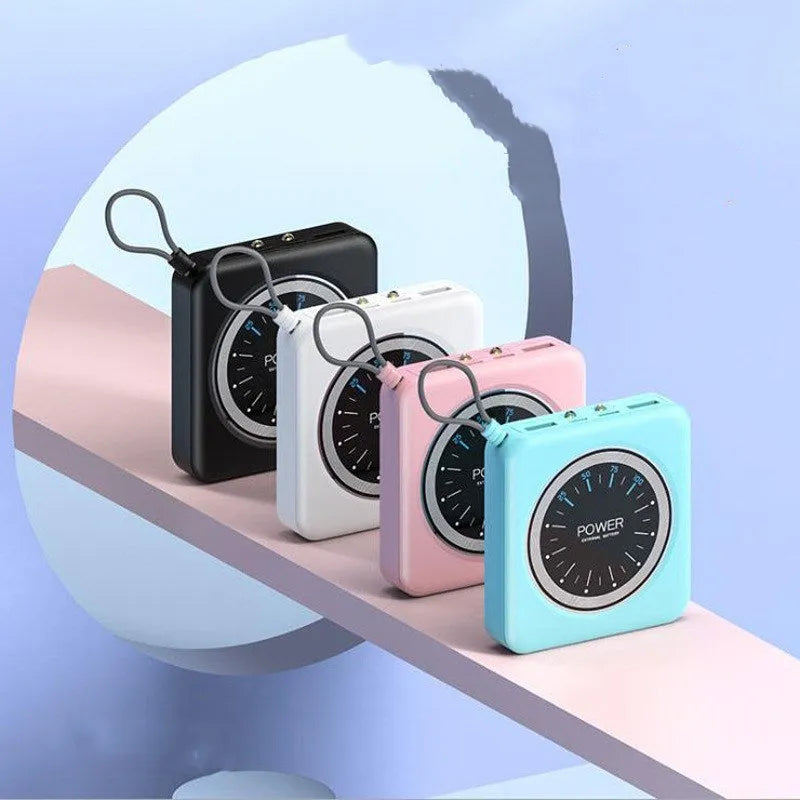 Compact mint green Mini Clock Charger power bank with alloy case showing multi-USB ports.