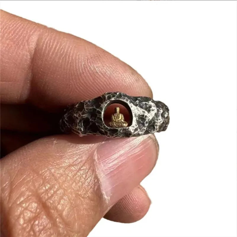 Hand-forged copper grotto Buddha ring with a rock texture finish, shown in size 8.