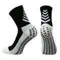 Men's black and green mid-calf athletic socks with a geometric pattern and non-slip silicone grip.