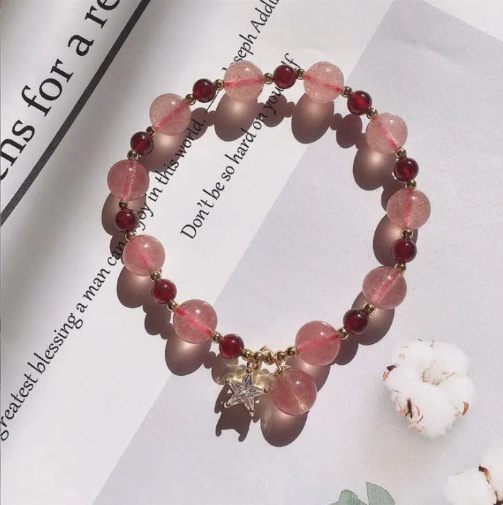 Handmade women's bracelet with Hetian jade and strawberry quartz crystals in peach blossom design