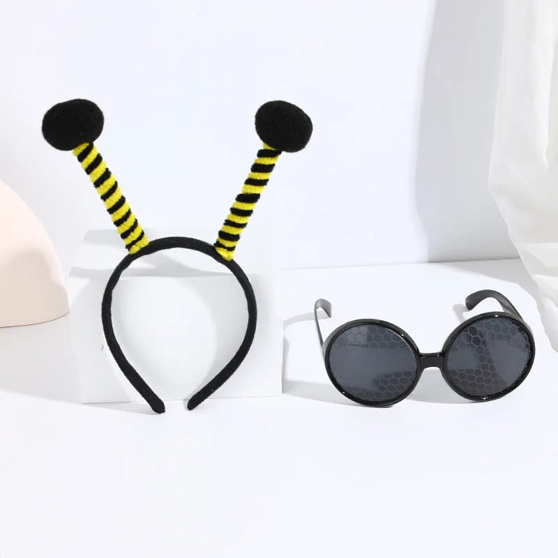 Bees party costume set with black and yellow striped headband and matching glasses