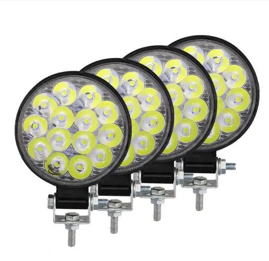 Compact round aluminium car LED work light with IP67 waterproof rating and 6000K white light output.