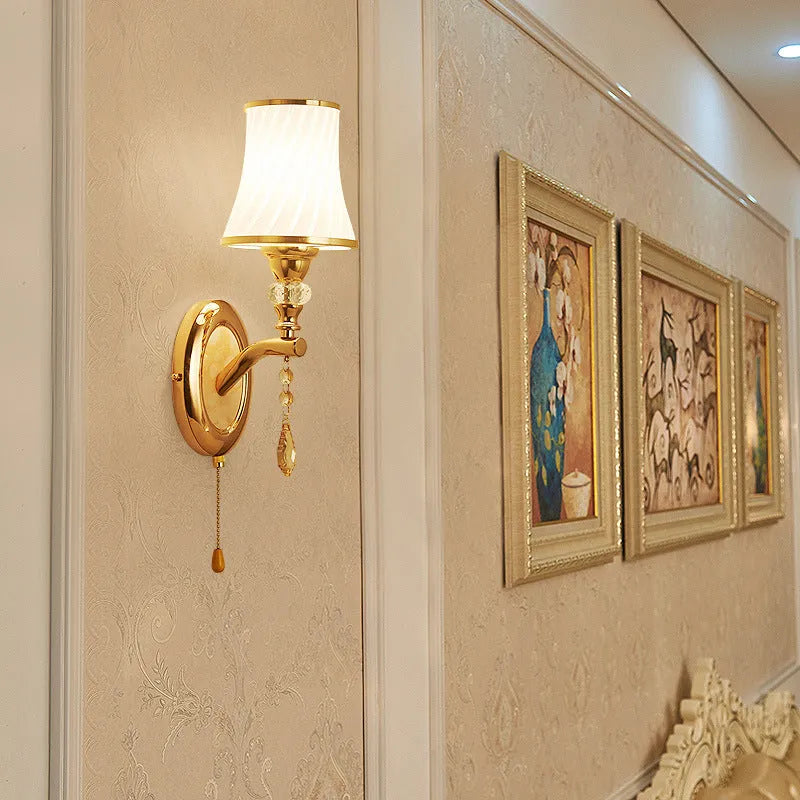 European style wall lamp with glass lampshade measuring 29 by 34 centimetres