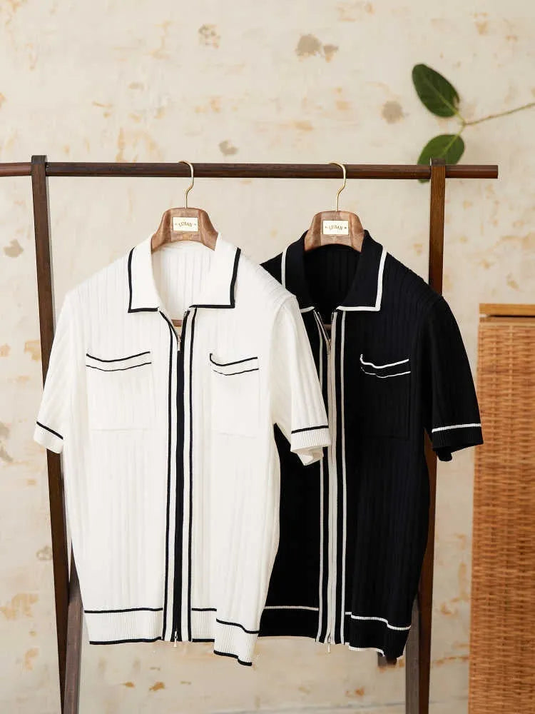 Slim fit black lapel polo shirt with short sleeves on a hanger.