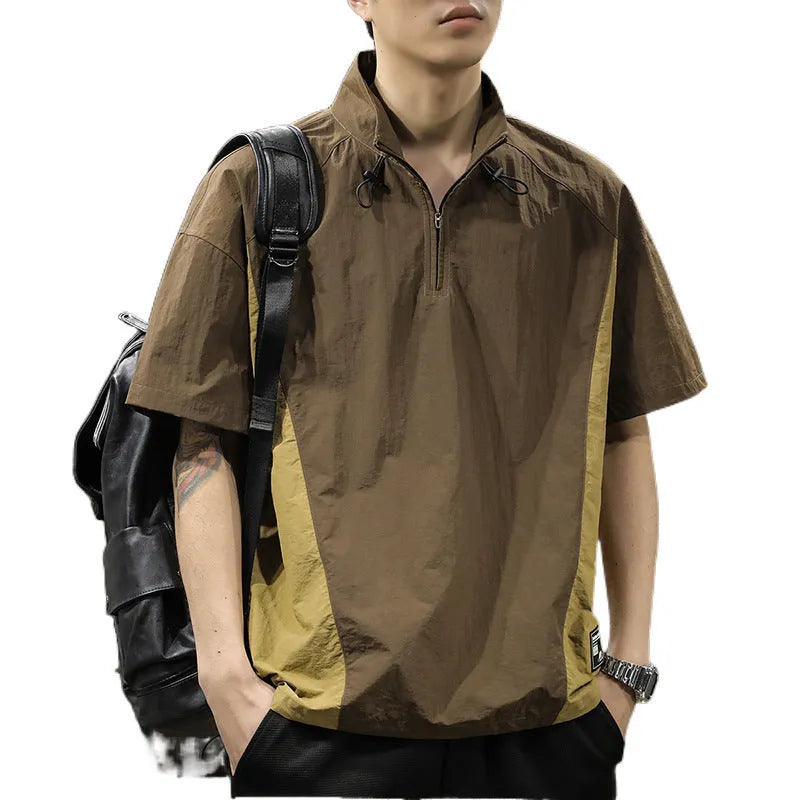 Brown men's half-zip stand collar casual shirt with short sleeves on a hanger.