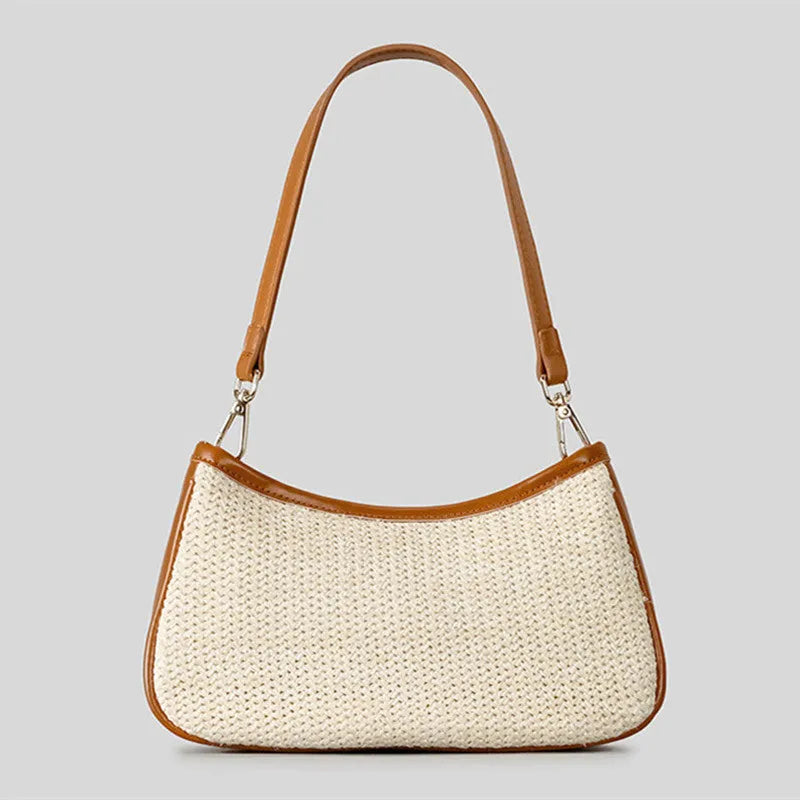 Khaki coloured hand-woven straw selenodon crossbody bag with a single shoulder strap