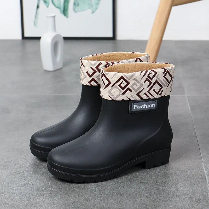 Women's mid-calf rain boots in PVC material with low heel for waterproof work wear