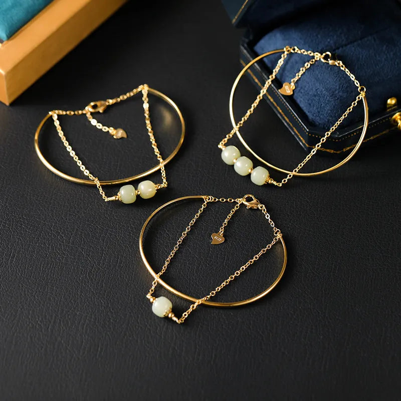 Women's jade lucky beads bracelet with gold inlay design in single, double, and three bead versions