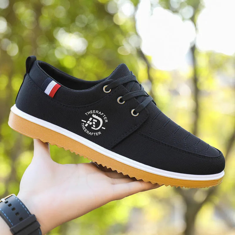 Men's black canvas casual shoes with a leather toe cap and a thick platform EVA sole.