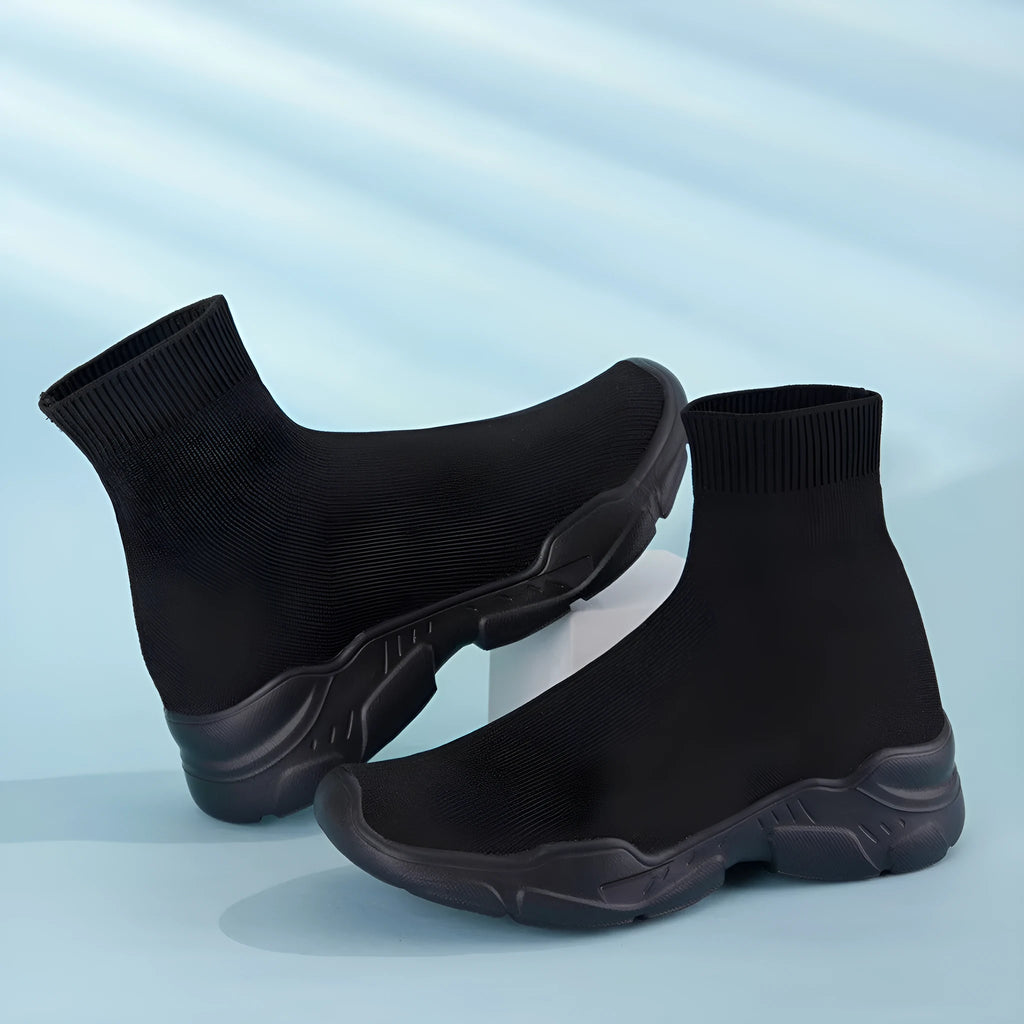 Thick-soled slip-on casual shoes in black with fabric upper and round toe