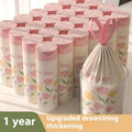 Pink degradable garbage bags with argy wormwood mosquito repellent and a bold drawstring.