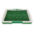 Green synthetic turf dog grass patch toilet training tray with three layers.
