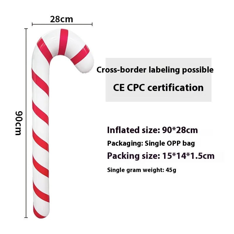 Large red and white inflatable Christmas ball with flashing lights in a garden setting