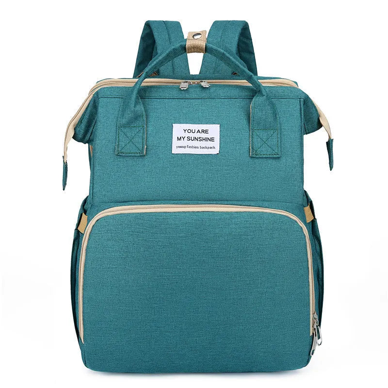 Lightweight nylon mother and baby bag with USB port, curved shoulder strap, shown in blue colour.