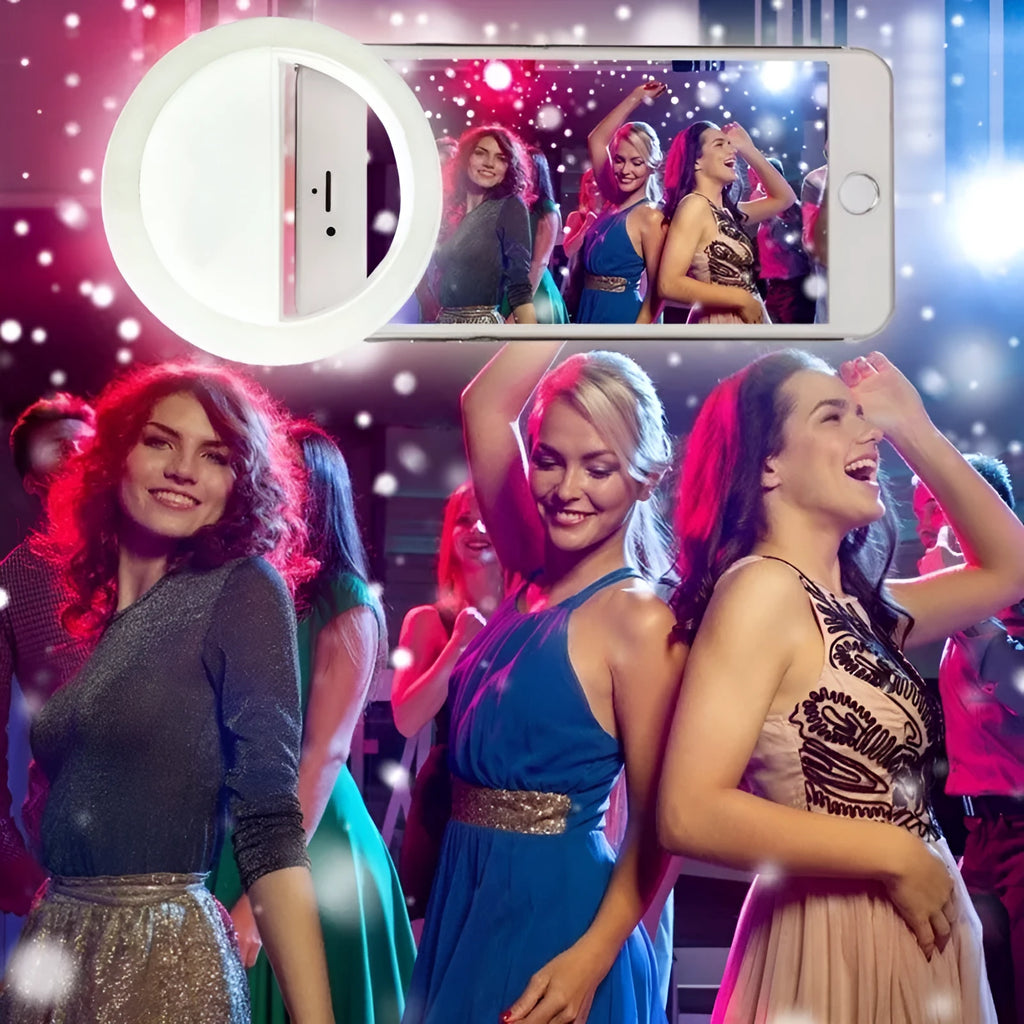 Mobile phone with clip-on selfie ring light showing LED illumination for photography