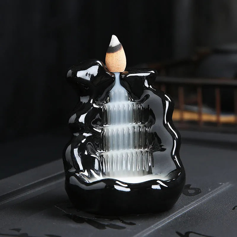 Ceramic backflow incense burner in a modern simple style, shown in one of four colour variations.